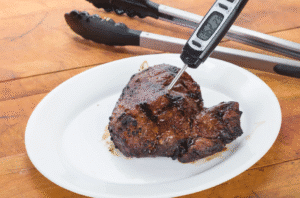 meat with thermometer in it image