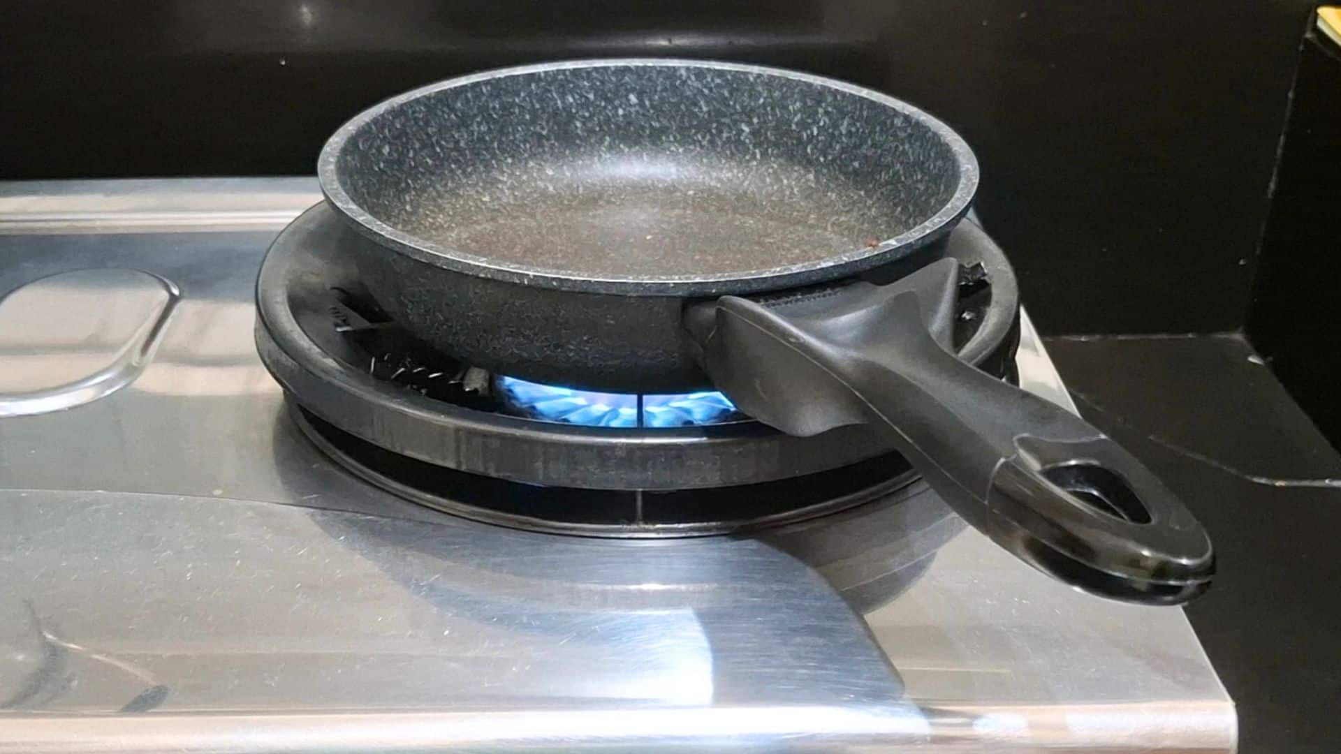 Preheat pan for Sweet and Spicy Marinade Steak recipe
